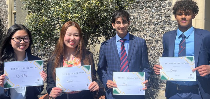  Winners of the Ros Nichol award in the Quad with their certificates 