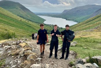 Pupils walking up mountains as part of the Three Peaks Challenge to raise money for charity
