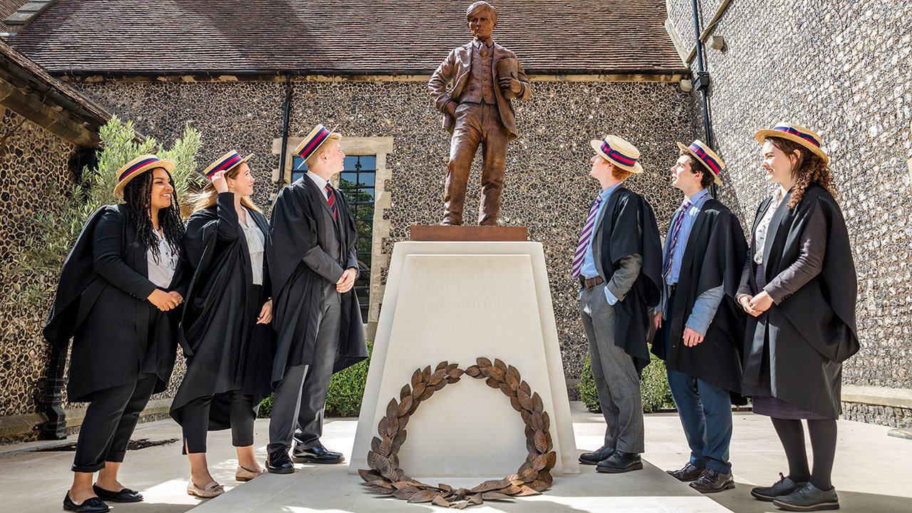 Brighton-College-Remembers-statue-with-pupils.jpg
